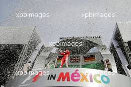 Sebastian Vettel (GER) Ferrari celebrates on the podium. 30.10.2016. Formula 1 World Championship, Rd 19, Mexican Grand Prix, Mexico City, Mexico, Race Day.