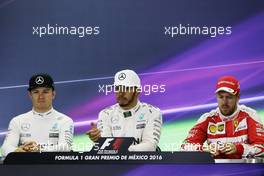 The FIA Press Conference (L to R): Nico Rosberg (GER) Mercedes AMG F1, second; Lewis Hamilton (GBR) Mercedes AMG F1, race winner; Sebastian Vettel (GER) Ferrari, third. 30.10.2016. Formula 1 World Championship, Rd 19, Mexican Grand Prix, Mexico City, Mexico, Race Day.