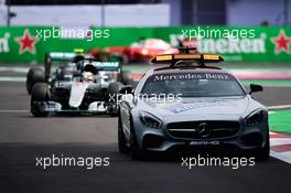 Lewis Hamilton (GBR) Mercedes AMG F1 W07 Hybrid leads behind the FIA Safety Car. 30.10.2016. Formula 1 World Championship, Rd 19, Mexican Grand Prix, Mexico City, Mexico, Race Day.