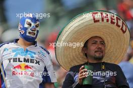 A masked fan and a Sergio Perez (MEX) Sahara Force India F1 fan. 30.10.2016. Formula 1 World Championship, Rd 19, Mexican Grand Prix, Mexico City, Mexico, Race Day.