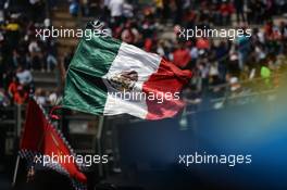 A Mecican flag waved by fans. 29.10.2016. Formula 1 World Championship, Rd 19, Mexican Grand Prix, Mexico City, Mexico, Qualifying Day.
