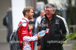 (L to R): Sebastian Vettel (GER) Ferrari with Otmar Szafnauer (USA) Sahara Force India F1 Chief Operating Officer. 30.10.2016. Formula 1 World Championship, Rd 19, Mexican Grand Prix, Mexico City, Mexico, Race Day.