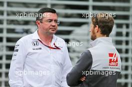 (L to R): Eric Boullier (FRA) McLaren Racing Director with Romain Grosjean (FRA) Haas F1 Team. 27.10.2016. Formula 1 World Championship, Rd 19, Mexican Grand Prix, Mexico City, Mexico, Preparation Day.