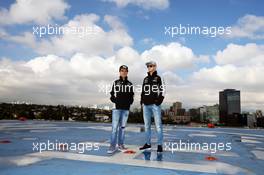 (L to R): Sergio Perez (MEX) Sahara Force India F1 and team mate Nico Hulkenberg (GER) Sahara Force India F1 on a rooftop helipad. 27.10.2016. Formula 1 World Championship, Rd 19, Mexican Grand Prix, Mexico City, Mexico, Preparation Day.