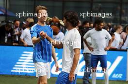 Daniil Kvyat (RUS) Scuderia Toro Rosso and Carlos Sainz Jr (ESP) Scuderia Toro Rosso at a charity football match. 26.10.2016. Formula 1 World Championship, Rd 19, Mexican Grand Prix, Mexico City, Mexico, Preparation Day.