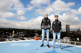 (L to R): Nico Hulkenberg (GER) Sahara Force India F1 with team mate Sergio Perez (MEX) Sahara Force India F1 on a rooftop helipad. 27.10.2016. Formula 1 World Championship, Rd 19, Mexican Grand Prix, Mexico City, Mexico, Preparation Day.