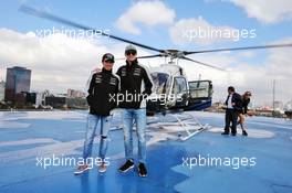 (L to R): Sergio Perez (MEX) Sahara Force India F1 and Nico Hulkenberg (GER) Sahara Force India F1 on a rooftop helipad. 27.10.2016. Formula 1 World Championship, Rd 19, Mexican Grand Prix, Mexico City, Mexico, Preparation Day.