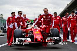 Ferrari SF16-H pushed to scrutineering. 27.10.2016. Formula 1 World Championship, Rd 19, Mexican Grand Prix, Mexico City, Mexico, Preparation Day.