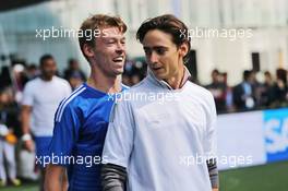 (L to R): Daniil Kvyat (RUS) Scuderia Toro Rosso with Esteban Gutierrez (MEX) Haas F1 Team at a charity football match. 26.10.2016. Formula 1 World Championship, Rd 19, Mexican Grand Prix, Mexico City, Mexico, Preparation Day.