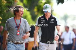 (L to R): Michael Schmidt (GER) Journalist with Nico Hulkenberg (GER) Sahara Force India F1. 30.09.2016. Formula 1 World Championship, Rd 16, Malaysian Grand Prix, Sepang, Malaysia, Friday.