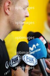 Kevin Magnussen (DEN) Renault Sport F1 Team with the media - Fox Sports. 30.09.2016. Formula 1 World Championship, Rd 16, Malaysian Grand Prix, Sepang, Malaysia, Friday.