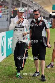 Nico Hulkenberg (GER) Sahara Force India F1 on the grid with Bradley Joyce (GBR) Sahara Force India F1 Race Engineer. 02.10.2016. Formula 1 World Championship, Rd 16, Malaysian Grand Prix, Sepang, Malaysia, Sunday.