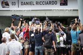 Media at the Red Bull Racing garage of race winner Daniel Ricciardo (AUS) Red Bull Racing. 02.10.2016. Formula 1 World Championship, Rd 16, Malaysian Grand Prix, Sepang, Malaysia, Sunday.
