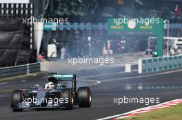 Lewis Hamilton (GBR) Mercedes AMG F1 W07 Hybrid retired from the race with a blown engine. 02.10.2016. Formula 1 World Championship, Rd 16, Malaysian Grand Prix, Sepang, Malaysia, Sunday.