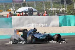 Lewis Hamilton (GBR) Mercedes AMG F1 W07 Hybrid retired from the race with a blown engine. 02.10.2016. Formula 1 World Championship, Rd 16, Malaysian Grand Prix, Sepang, Malaysia, Sunday.