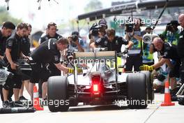 Lewis Hamilton (GBR) Mercedes AMG F1 W07 Hybrid in the pits. 01.10.2016. Formula 1 World Championship, Rd 16, Malaysian Grand Prix, Sepang, Malaysia, Saturday.