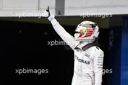 Lewis Hamilton (GBR) Mercedes AMG F1 celebrates his pole position in parc ferme. 01.10.2016. Formula 1 World Championship, Rd 16, Malaysian Grand Prix, Sepang, Malaysia, Saturday.