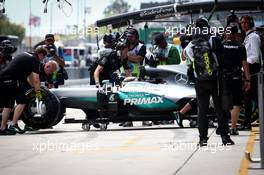 Lewis Hamilton (GBR) Mercedes AMG F1 W07 Hybrid in the pits. 01.10.2016. Formula 1 World Championship, Rd 16, Malaysian Grand Prix, Sepang, Malaysia, Saturday.
