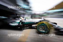 Lewis Hamilton (GBR) Mercedes AMG F1 W07 Hybrid leaves the pits. 01.10.2016. Formula 1 World Championship, Rd 16, Malaysian Grand Prix, Sepang, Malaysia, Saturday.