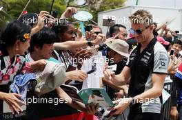 Nico Hulkenberg (GER) Sahara Force India F1 signs autographs for the fans. 01.10.2016. Formula 1 World Championship, Rd 16, Malaysian Grand Prix, Sepang, Malaysia, Saturday.