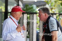 (L to R): Niki Lauda (AUT) Mercedes Non-Executive Chairman with Otmar Szafnauer (USA) Sahara Force India F1 Chief Operating Officer. 02.10.2016. Formula 1 World Championship, Rd 16, Malaysian Grand Prix, Sepang, Malaysia, Sunday.