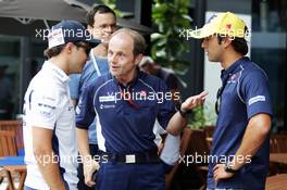 (L to R): Felipe Massa (BRA) Williams with Joseph Lieberer (SUI) Sauber Physio and Felipe Nasr (BRA) Sauber F1 Team. 29.09.2016. Formula 1 World Championship, Rd 16, Malaysian Grand Prix, Sepang, Malaysia, Thursday.