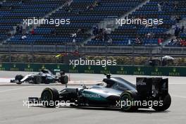 Lewis Hamilton (GBR) Mercedes AMG F1 W07 Hybrid is passed by team mate after he spun. 29.10.2016. Formula 1 World Championship, Rd 4, Russian Grand Prix, Sochi Autodrom, Sochi, Russia, Practice Day.