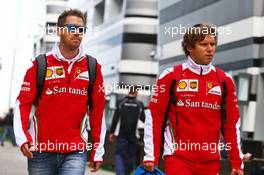 (L to R): Sebastian Vettel (GER) Ferrari with Antti Kontsas (FIN) Personal Trainer. 29.10.2016. Formula 1 World Championship, Rd 4, Russian Grand Prix, Sochi Autodrom, Sochi, Russia, Practice Day.