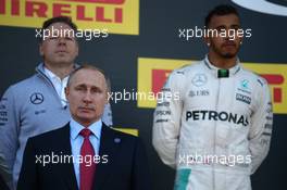 Vladimir Putin (RUS) Russian Federation President with 2nd place Lewis Hamilton (GBR) Mercedes Petronas AMG F1. 01.05.2016. Formula 1 World Championship, Rd 4, Russian Grand Prix, Sochi Autodrom, Sochi, Russia, Race Day.