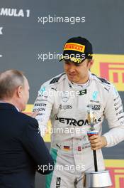 Race winner Nico Rosberg (GER) Mercedes AMG F1 celebrates on the podium with Vladimir Putin (RUS) Russian Federation President. 01.05.2016. Formula 1 World Championship, Rd 4, Russian Grand Prix, Sochi Autodrom, Sochi, Russia, Race Day.