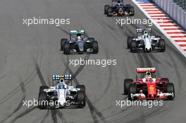 (L to R): Valtteri Bottas (FIN) Williams FW38 and Kimi Raikkonen (FIN) Ferrari SF16-H battle for position. 01.05.2016. Formula 1 World Championship, Rd 4, Russian Grand Prix, Sochi Autodrom, Sochi, Russia, Race Day.