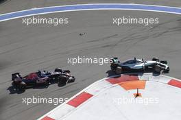 Lewis Hamilton (GBR) Mercedes AMG F1 W07 Hybrid leads Max Verstappen (NLD) Scuderia Toro Rosso STR11. 01.05.2016. Formula 1 World Championship, Rd 4, Russian Grand Prix, Sochi Autodrom, Sochi, Russia, Race Day.