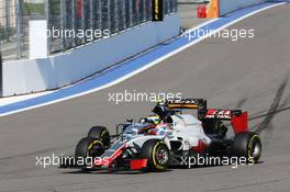 Romain Grosjean (FRA) Haas F1 Team VF-16 and Sergio Perez (MEX) Sahara Force India F1 VJM09. 01.05.2016. Formula 1 World Championship, Rd 4, Russian Grand Prix, Sochi Autodrom, Sochi, Russia, Race Day.