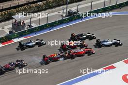 Daniil Kvyat (RUS) Red Bull Racing RB12 crashes into Sebastian Vettel (GER) Ferrari SF16-H at the start of the race. 01.05.2016. Formula 1 World Championship, Rd 4, Russian Grand Prix, Sochi Autodrom, Sochi, Russia, Race Day.