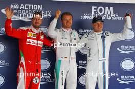 Qualifying top three in parc ferme (L to R): Sebastian Vettel (GER) Ferrari, second; Nico Rosberg (GER) Mercedes AMG F1, pole position; Valtteri Bottas (FIN) Williams, third. 30.04.2016. Formula 1 World Championship, Rd 4, Russian Grand Prix, Sochi Autodrom, Sochi, Russia, Qualifying Day.