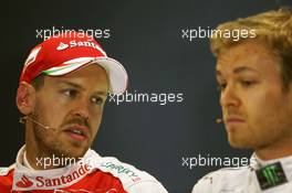 (L to R): Sebastian Vettel (GER) Ferrari with Nico Rosberg (GER) Mercedes AMG F1 in the FIA Press Conference. 30.04.2016. Formula 1 World Championship, Rd 4, Russian Grand Prix, Sochi Autodrom, Sochi, Russia, Qualifying Day.