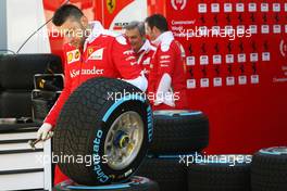 Ferrari mechanic with a Pirelli tyre. 28.04.2016. Formula 1 World Championship, Rd 4, Russian Grand Prix, Sochi Autodrom, Sochi, Russia, Preparation Day.