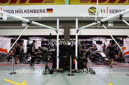 Nico Hulkenberg (GER) Sahara Force India F1 VJM09 and Sergio Perez (MEX) Sahara Force India F1 VJM09 pit garages. 16.09.2016. Formula 1 World Championship, Rd 15, Singapore Grand Prix, Marina Bay Street Circuit, Singapore, Practice Day.