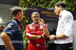 (L to R): Christian Horner (GBR) Red Bull Racing Team Principal with Maurizio Arrivabene (ITA) Ferrari Team Principal and Toto Wolff (GER) Mercedes AMG F1 Shareholder and Executive Director. 16.09.2016. Formula 1 World Championship, Rd 15, Singapore Grand Prix, Marina Bay Street Circuit, Singapore, Practice Day.