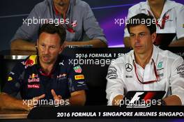 (L to R): Christian Horner (GBR) Red Bull Racing Team Principal and Toto Wolff (GER) Mercedes AMG F1 Shareholder and Executive Director in the FIA Press Conference. 16.09.2016. Formula 1 World Championship, Rd 15, Singapore Grand Prix, Marina Bay Street Circuit, Singapore, Practice Day.