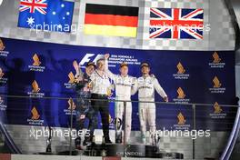 The podium (L to R): Daniel Ricciardo (AUS) Red Bull Racing, second; Nico Rosberg (GER) Mercedes AMG F1, race winner; Lewis Hamilton (GBR) Mercedes AMG F1, third. 18.09.2016. Formula 1 World Championship, Rd 15, Singapore Grand Prix, Marina Bay Street Circuit, Singapore, Race Day.