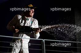 Race winner Nico Rosberg (GER) Mercedes AMG F1 celebrates on the podium. 18.09.2016. Formula 1 World Championship, Rd 15, Singapore Grand Prix, Marina Bay Street Circuit, Singapore, Race Day.