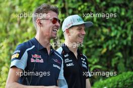 (L to R): Daniil Kvyat (RUS) Scuderia Toro Rosso with Nico Hulkenberg (GER) Sahara Force India F1. 18.09.2016. Formula 1 World Championship, Rd 15, Singapore Grand Prix, Marina Bay Street Circuit, Singapore, Race Day.