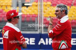 (L to R): Kimi Raikkonen (FIN) Ferrari with Maurizio Arrivabene (ITA) Ferrari Team Principal. 15.09.2016. Formula 1 World Championship, Rd 15, Singapore Grand Prix, Marina Bay Street Circuit, Singapore, Preparation Day.