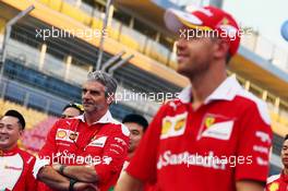 Maurizio Arrivabene (ITA) Ferrari Team Principal and Sebastian Vettel (GER) Ferrari. 15.09.2016. Formula 1 World Championship, Rd 15, Singapore Grand Prix, Marina Bay Street Circuit, Singapore, Preparation Day.