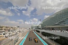 (L to R): Lewis Hamilton (GBR) Mercedes AMG F1 W07 Hybrid with Kevin Magnussen (DEN) Renault Sport F1 Team RS16. 25.11.2016. Formula 1 World Championship, Rd 21, Abu Dhabi Grand Prix, Yas Marina Circuit, Abu Dhabi, Practice Day.