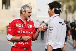 (L to R): Maurizio Arrivabene (ITA) Ferrari Team Principal with Toto Wolff (GER) Mercedes AMG F1 Shareholder and Executive Director. 25.11.2016. Formula 1 World Championship, Rd 21, Abu Dhabi Grand Prix, Yas Marina Circuit, Abu Dhabi, Practice Day.