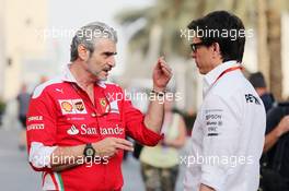 (L to R): Maurizio Arrivabene (ITA) Ferrari Team Principal with Toto Wolff (GER) Mercedes AMG F1 Shareholder and Executive Director. 25.11.2016. Formula 1 World Championship, Rd 21, Abu Dhabi Grand Prix, Yas Marina Circuit, Abu Dhabi, Practice Day.