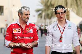 (L to R): Maurizio Arrivabene (ITA) Ferrari Team Principal with Toto Wolff (GER) Mercedes AMG F1 Shareholder and Executive Director. 25.11.2016. Formula 1 World Championship, Rd 21, Abu Dhabi Grand Prix, Yas Marina Circuit, Abu Dhabi, Practice Day.