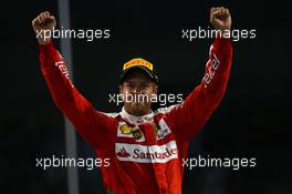 3rd place Sebastian Vettel (GER) Scuderia Ferrari SF16-H. 27.11.2016. Formula 1 World Championship, Rd 21, Abu Dhabi Grand Prix, Yas Marina Circuit, Abu Dhabi, Race Day.